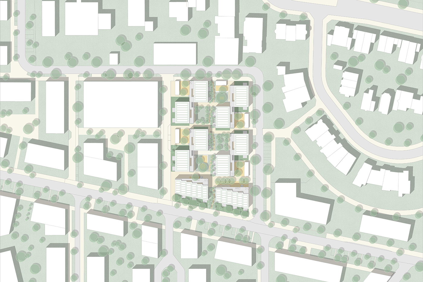 KI-basierte Bildbeschreibung | Ein Luftbild des Geländes zeigt mehrere rechteckige Gebäude, die um eine zentrale Grünfläche angeordnet und von Straßen, Bäumen und benachbarten Gebäuden umgeben sind.